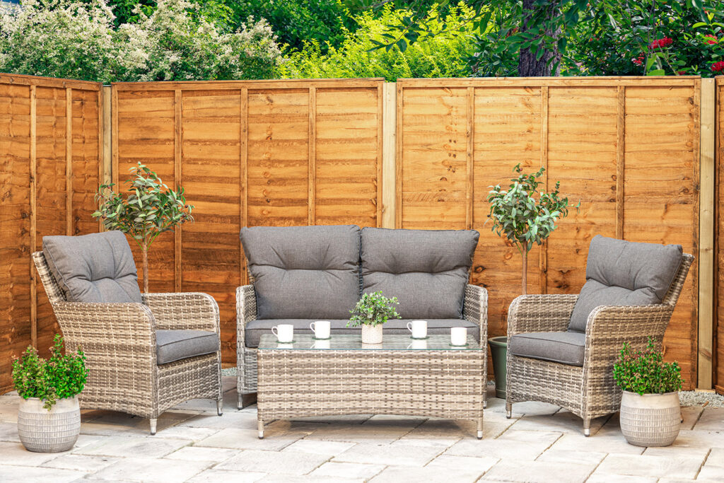 Rattan sofa set in garden